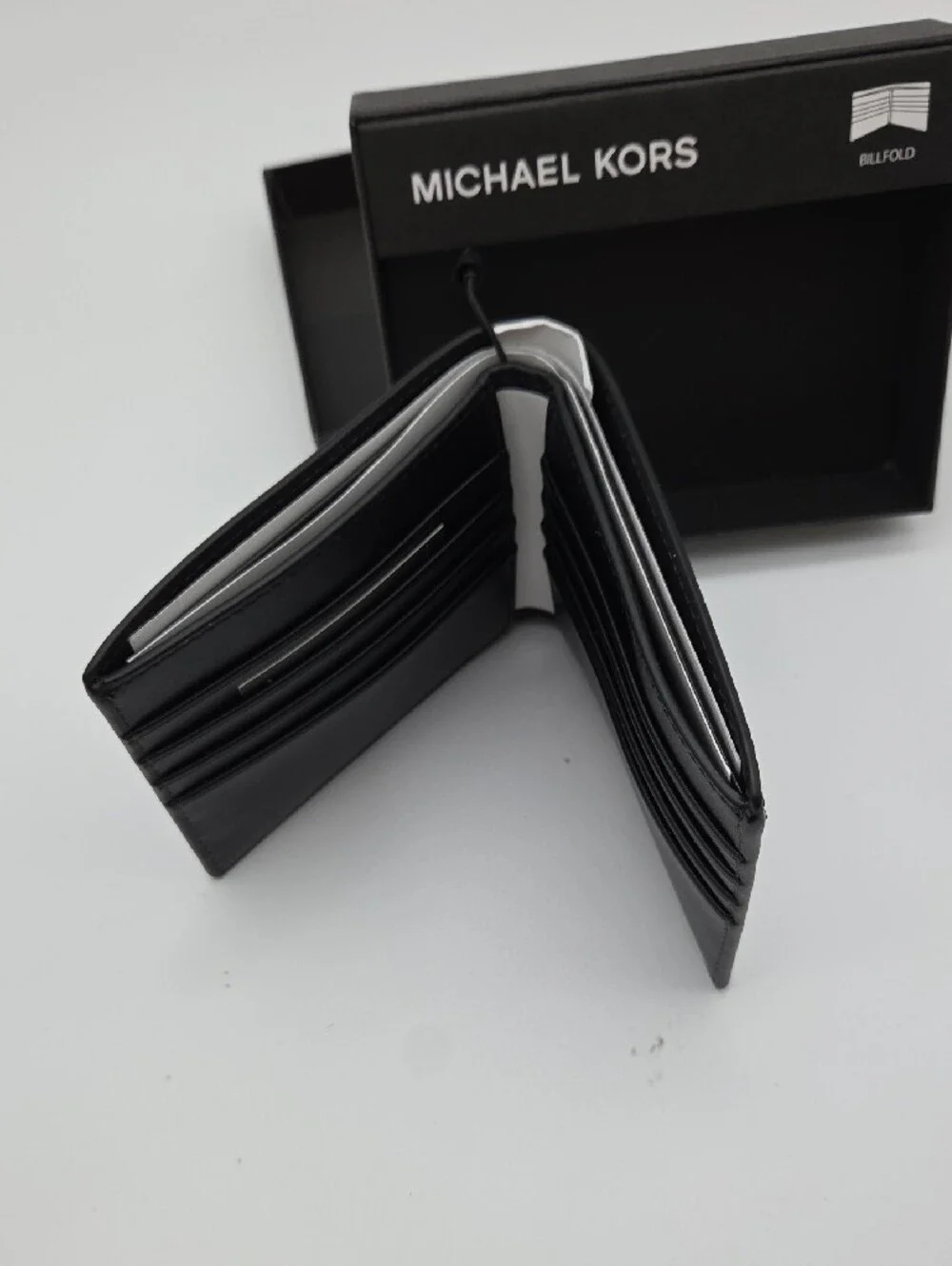 Michael Kors White and Light Gray Signature Bi-Fold Wallet